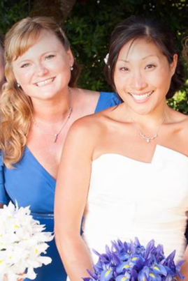 See! Just stand behind the bride and no one can see your bussom bursting forth!